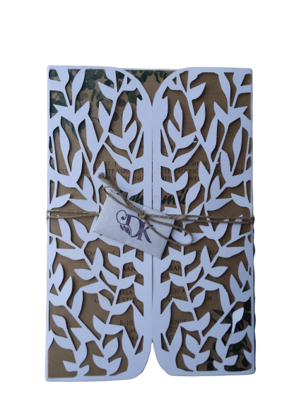 100% Recycled Unbleached Brown Paper Wedding Invite with White Laser Cut Door & Seed Bag Wrapped in Jute Thread.