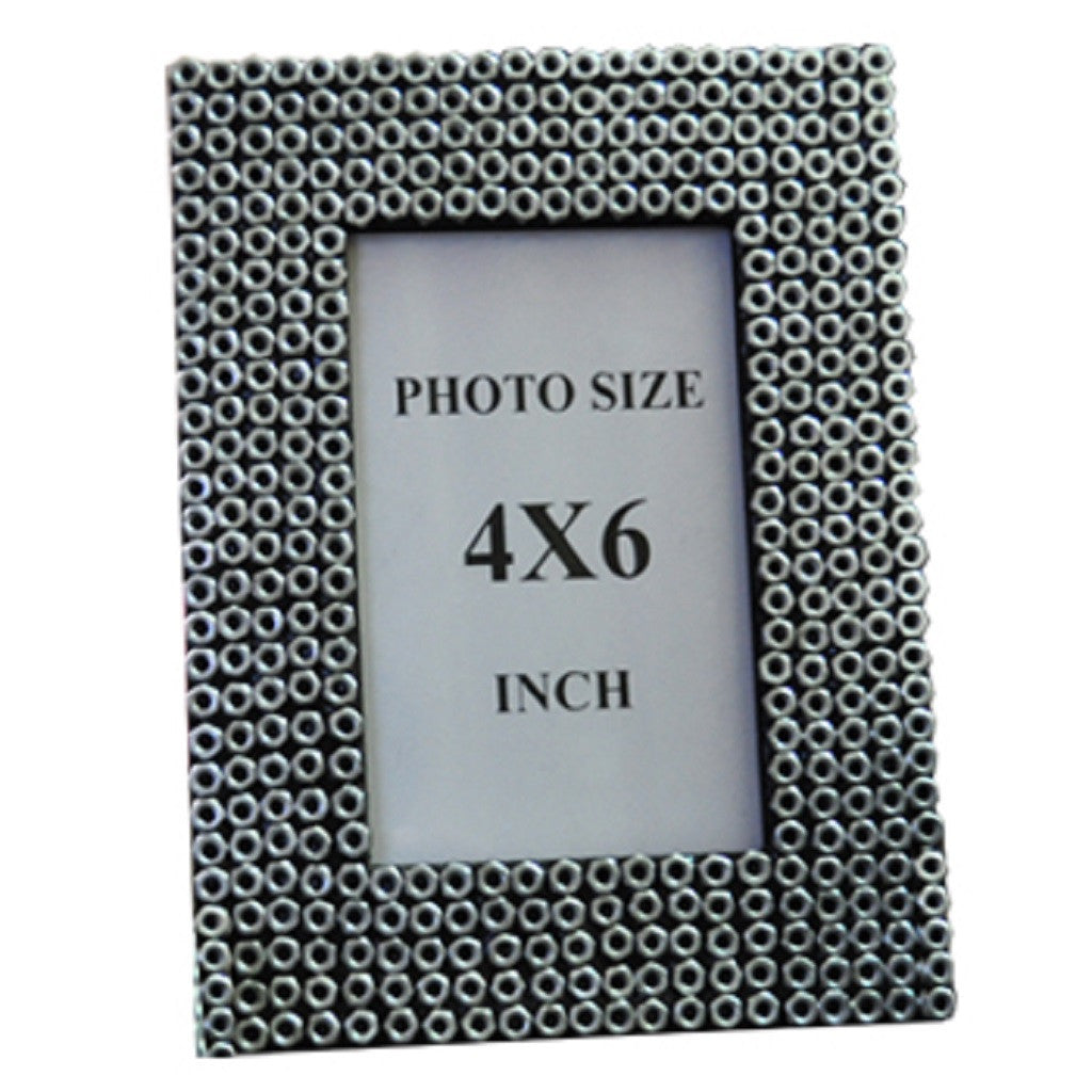 Stunning photo frame ( 4 x 6) made out of waste metal nuts