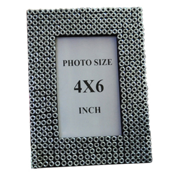Stunning photo frame ( 4 x 6) made out of waste metal nuts